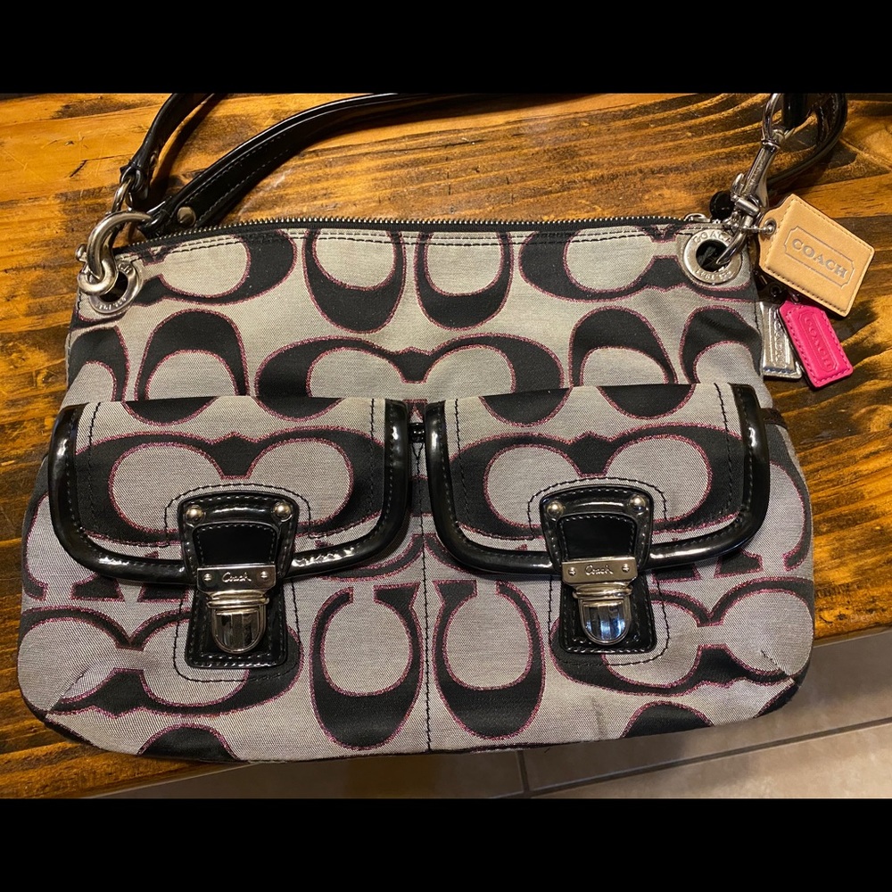 Silver and black Coach purse.